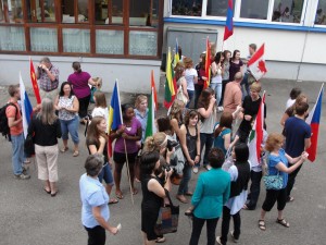 Seniors with flags preparing to enter