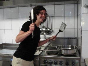 Carrie with the enormous cooking utensils