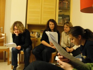 The group studies the script