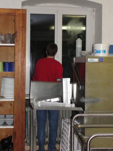 This student had to crawl through the dishwasher's drying rack to get to these windows!