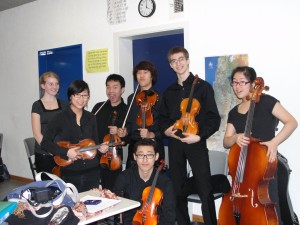 Here is the orchestra after performing, excited from the adrenaline rush and glad to have made it through the recital