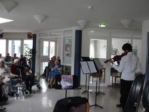 K.K. and J.K. perform a duet for the folks at Luisa Klaiber Haus