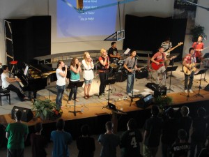 chapel band leads worship