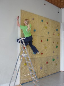 painting the edge of the climbing wall