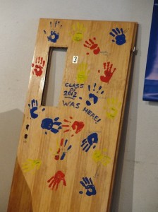 The Door to Micah's former classroom, upon which many of the seniors put their 8th-grade handprints.